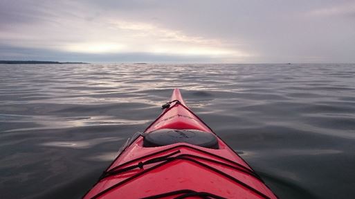 Photo of bow of kayak facing the sea