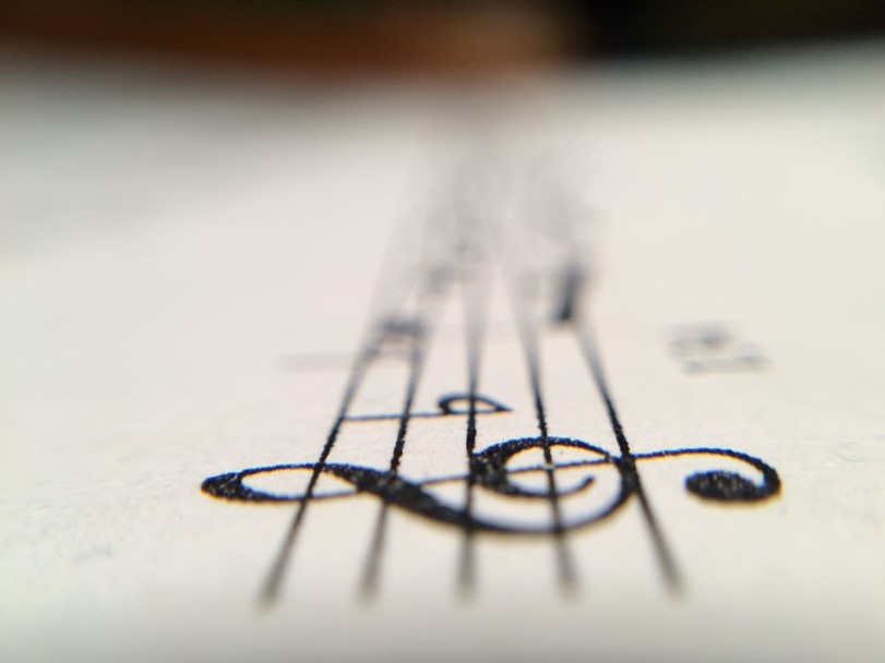 Photo of Close-up of treble clef on music sheet