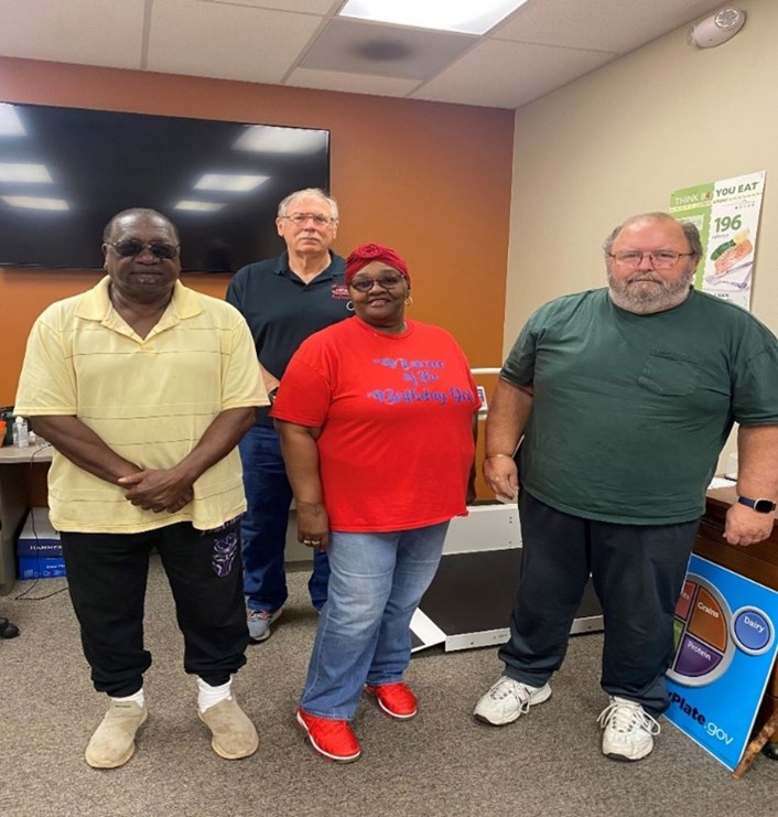 Photo of a group of Veterans at the Conway VA Clinic joining their efforts with MOVE!