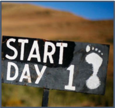 Photo of a sign that says Start Day 1