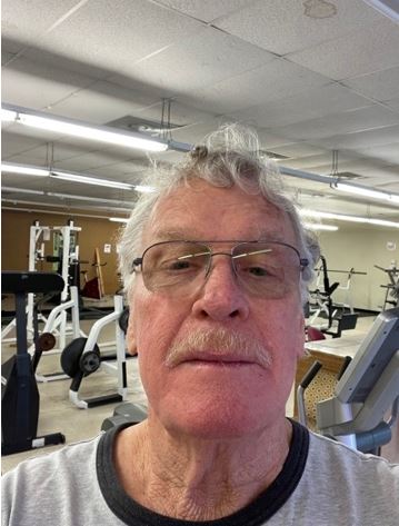 Photo of Veteran John Moore at the gym.