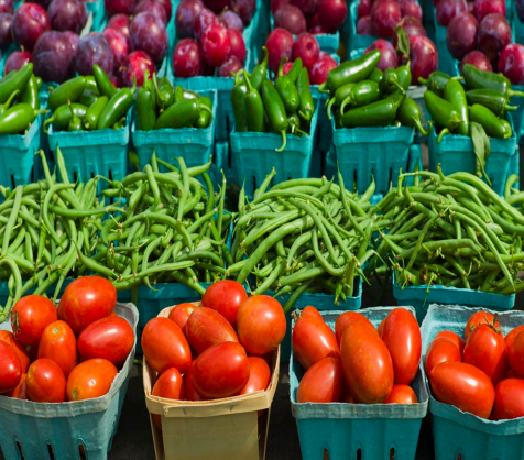 Photo of rows of colorful produce in small baskets