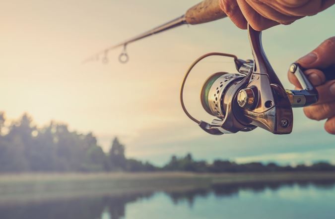 Photo of Fishing on the lake at sunset